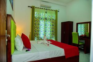 Ένα ή περισσότερα κρεβάτια σε δωμάτιο στο KK City Villa