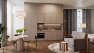 una sala de estar con un sofá y una mesa en Carillon Aparthotel - Keystone Collection, en Riga 10 fotos más