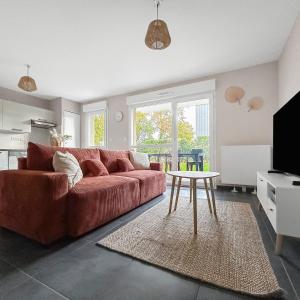 Μια τηλεόραση ή/και κέντρο ψυχαγωγίας στο Parking privé, Terrasse & Jardin, Cosy & Moderne