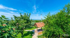 an aerial view of a house with trees at Villa Kamenjarka in Široki Brijeg