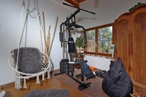 a room with a gym with a exercise bike at Family friendly house with a swimming pool Grizane, Crikvenica - 24302 in Grižane