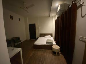 Postel nebo postele na pokoji v ubytování Brookside Inn