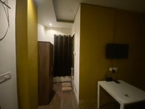 TV a/nebo společenská místnost v ubytování Brookside Inn