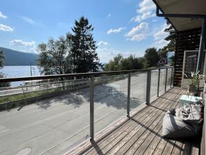 a balcony of a house with a view of the water at Åre Stay - VM huset centralt i Åre in Åre