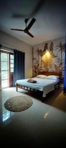 コーチにあるGoodkarma Innのベッドルーム1室(大型ベッド1台、シーリングファン付) +14枚の写真