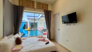 Et tv og/eller underholdning på Tabi Bito Poolvilla ทาบิ บิโตะ