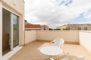 En balkon eller terrasse på Uma Suites O'Donnell