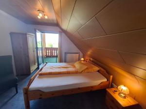 Postel nebo postele na pokoji v ubytování Pension Hubertushöhe