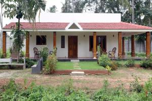 Κήπος έξω από το Nirmala Dhama Farmstay - Serene Family Retreat +2 φωτογραφίες