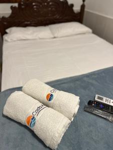 Ένα ή περισσότερα κρεβάτια σε δωμάτιο στο Pousada Costa Azul +11 φωτογραφίες