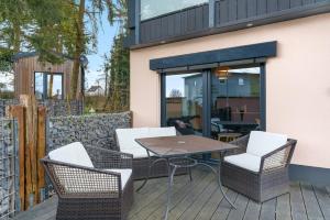 Posezení v ubytování Wunderschönes Ferienhaus im Grünen