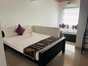 Postel nebo postele na pokoji v ubytování Aqua Hotel Yala + 37 fotografií