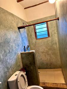 Koupelna v ubytování Carolina residences + 14 fotografií