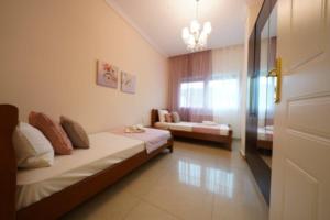 Postel nebo postele na pokoji v ubytování V_Paradise