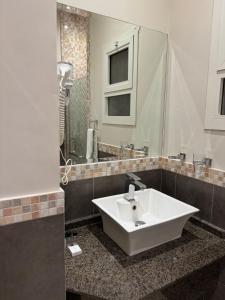 Ένα μπάνιο στο Prime Al Hamra Hotel Riyadh