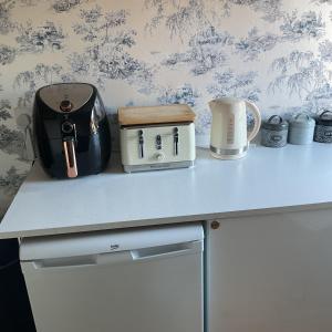 Η κουζίνα ή μικρή κουζίνα στο Ginnies at 38