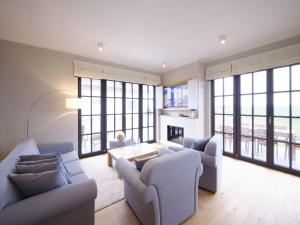 Istumisnurk majutusasutuses Reetland am Meer - LuxusPlus Reetdachvilla mit 4 Schlafzimmern, Sauna und Kamin G15