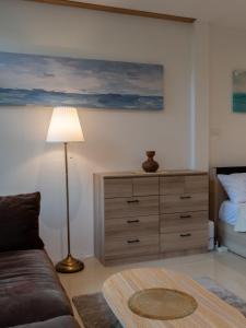 Ένα ή περισσότερα κρεβάτια σε δωμάτιο στο Bamboo House