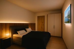 Ένα ή περισσότερα κρεβάτια σε δωμάτιο στο ELEVATE Apartment - Opening December 2025