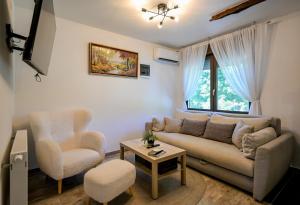 Posezení v ubytování Kuća za odmor Olympus