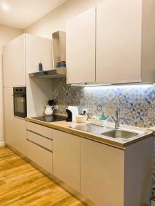 Kuchyň nebo kuchyňský kout v ubytování Podere Centoquattro - Appartamento "Il Blu"