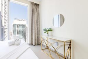 Postel nebo postele na pokoji v ubytování Stylish 2BR in Forte 2 + 35 fotografií