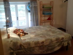 Ένα ή περισσότερα κρεβάτια σε δωμάτιο στο Altrove - a due passi da Chiavari