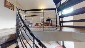 a view from the top of a staircase in a house at Ferienwohnung Silo Mit Kleinem Garten in Poppendorf