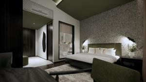 Postel nebo postele na pokoji v ubytování Maha Party Resort Canggu + 28 fotografií