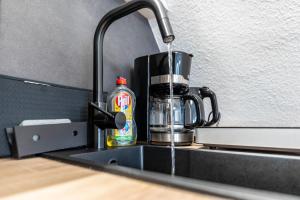 Kuchyň nebo kuchyňský kout v ubytování Louis Hafenblick