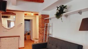 TV a/nebo společenská místnost v ubytování Mas Lloretó - La Oreneta