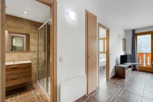 a bathroom with a shower and a sink at Family-Friendly Andorra Accommodation - Happy Rentals in El Tarter
