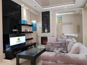 Μια τηλεόραση ή/και κέντρο ψυχαγωγίας στο 3 комн квартира в элитном районе