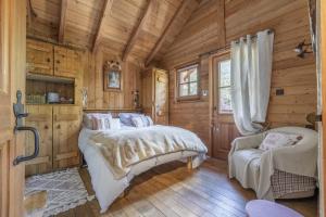 Ένα ή περισσότερα κρεβάτια σε δωμάτιο στο Chalet Echyllo