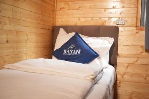 Giường trong phòng chung tại Rayan Eco Resort Sary Oi - Раян Резорт - ущелье Сары-Ой