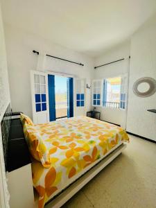 Ένα ή περισσότερα κρεβάτια σε δωμάτιο στο Apparemment 3 chambres et balcon