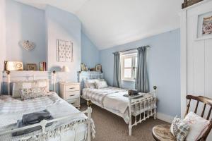 Una cama o camas en una habitación de Pinkleton