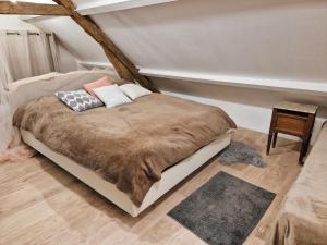 Ένα ή περισσότερα κρεβάτια σε δωμάτιο στο Dortoir 8 personnes dans Beau Gîte