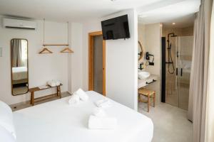 Ένα ή περισσότερα κρεβάτια σε δωμάτιο στο Hotel Boutique Maram-Adults Only +117 φωτογραφίες