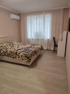 Postel nebo postele na pokoji v ubytování Квартира в центрі міста