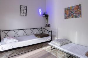 a bedroom with two beds in a room at Comfort Zone - Spacious Apartment in Xanthi in Xanthi