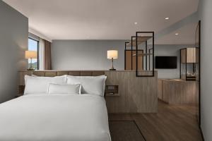 Ένα ή περισσότερα κρεβάτια σε δωμάτιο στο AC Hotel by Marriott Puchong