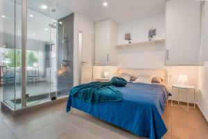 Ένα ή περισσότερα κρεβάτια σε δωμάτιο στο Blue Oasis Mesa del Mar