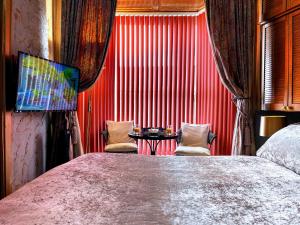 Ένα ή περισσότερα κρεβάτια σε δωμάτιο στο Have A Mediterranean Stay In Swansea Tonight