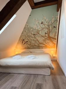 Giường trong phòng chung tại Bird Suite