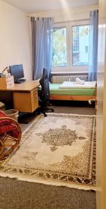 Un pat sau paturi într-o cameră la Doppelzimmer mit Garten, Kicker und Grill