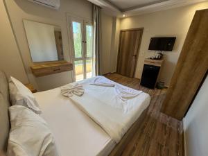 Ένα ή περισσότερα κρεβάτια σε δωμάτιο στο Brench Pyramids View