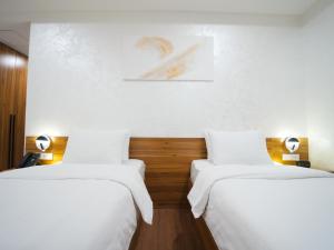 Postel nebo postele na pokoji v ubytování Avant Express Hotel Pool&Spa