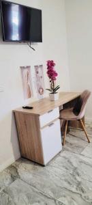 Μια τηλεόραση ή/και κέντρο ψυχαγωγίας στο Oty Residence 2 Iasi +18 φωτογραφίες