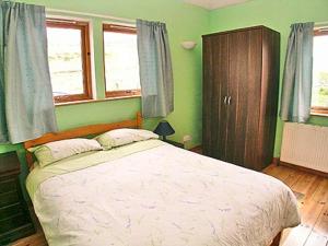 Postel nebo postele na pokoji v ubytování Feriniquarrie